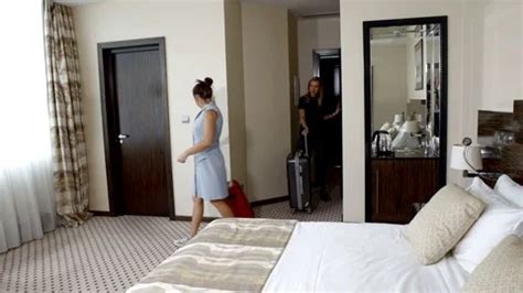 lesbian making out video|Two girls lesbian checking in to the hotel room. Vacation together。